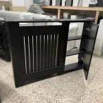 Black radiator cover with side shelving & door