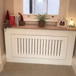 Door front Radiator Cover with a Solid Oak Top and Vetical Slat fretwork