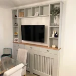 Cornforth White Radiator cover with functional drawers and shelving