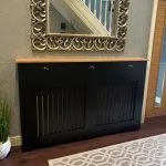 Black Radiator Cover with drawers and panel fretwork and a light Solid Oak Top