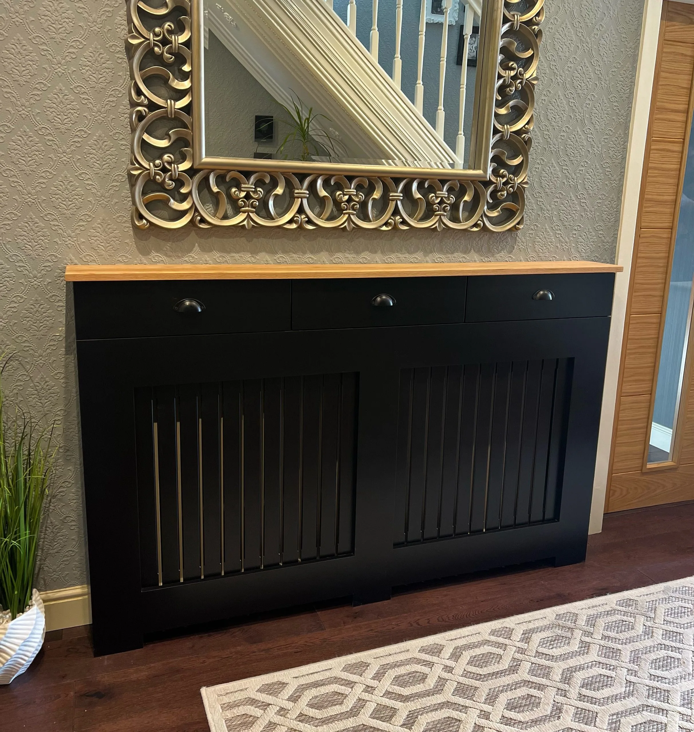 Black Radiator Cover with drawers and vertical slat design and a teak oil Solid Oak Top