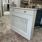 Skimming Stone Radiator Cover with drawers and vertical slat design and a light Solid Oak Top