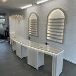 Curved nail desk, 4 stations, reeded design, LED lights, Farrow & Ball Skimming stone, 4 sets of drawers