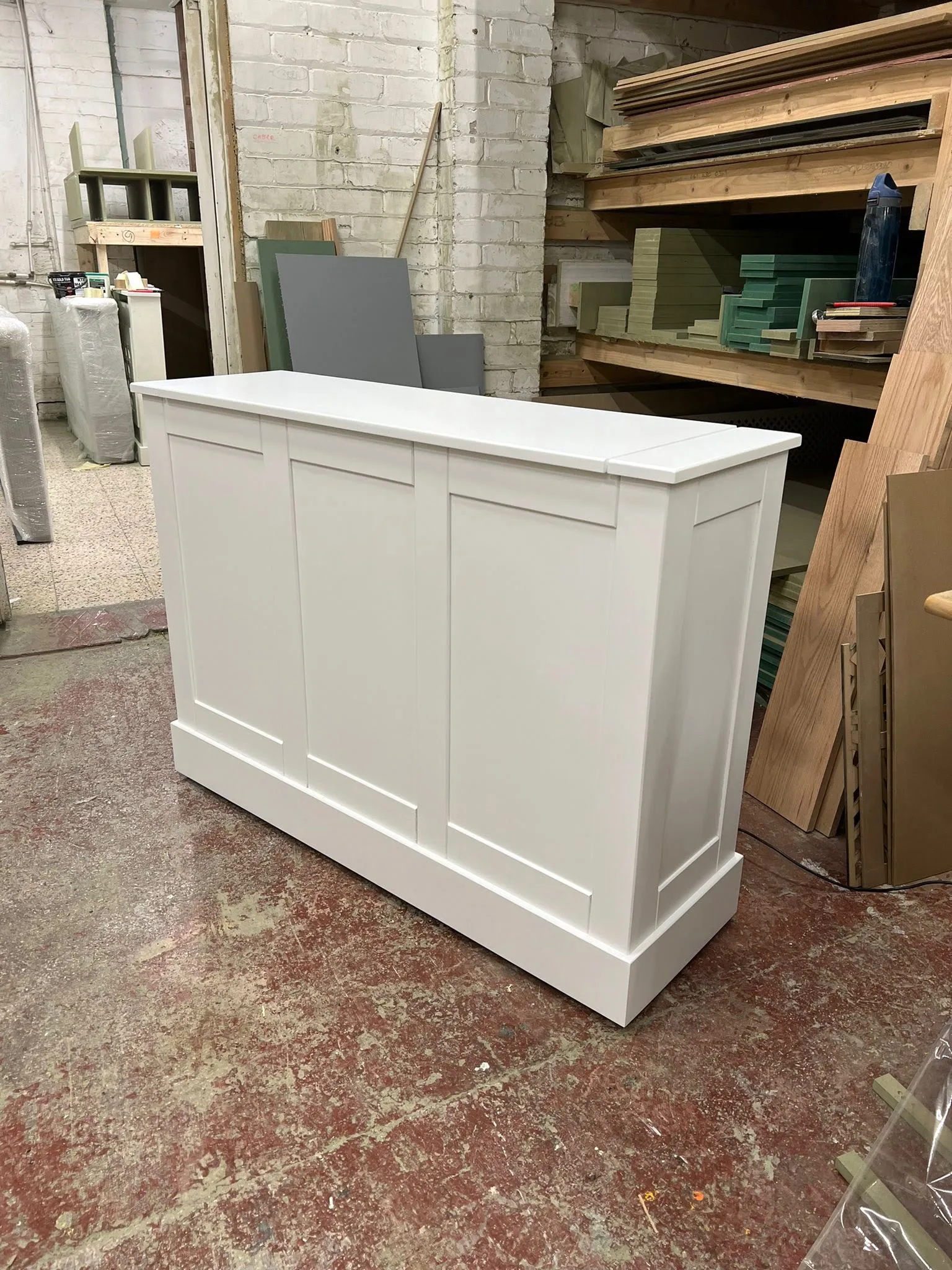 Sleek White Motorised Television Stand