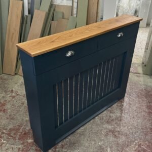 Custom white bespoke radiator cover with two functional drawers in a modern home