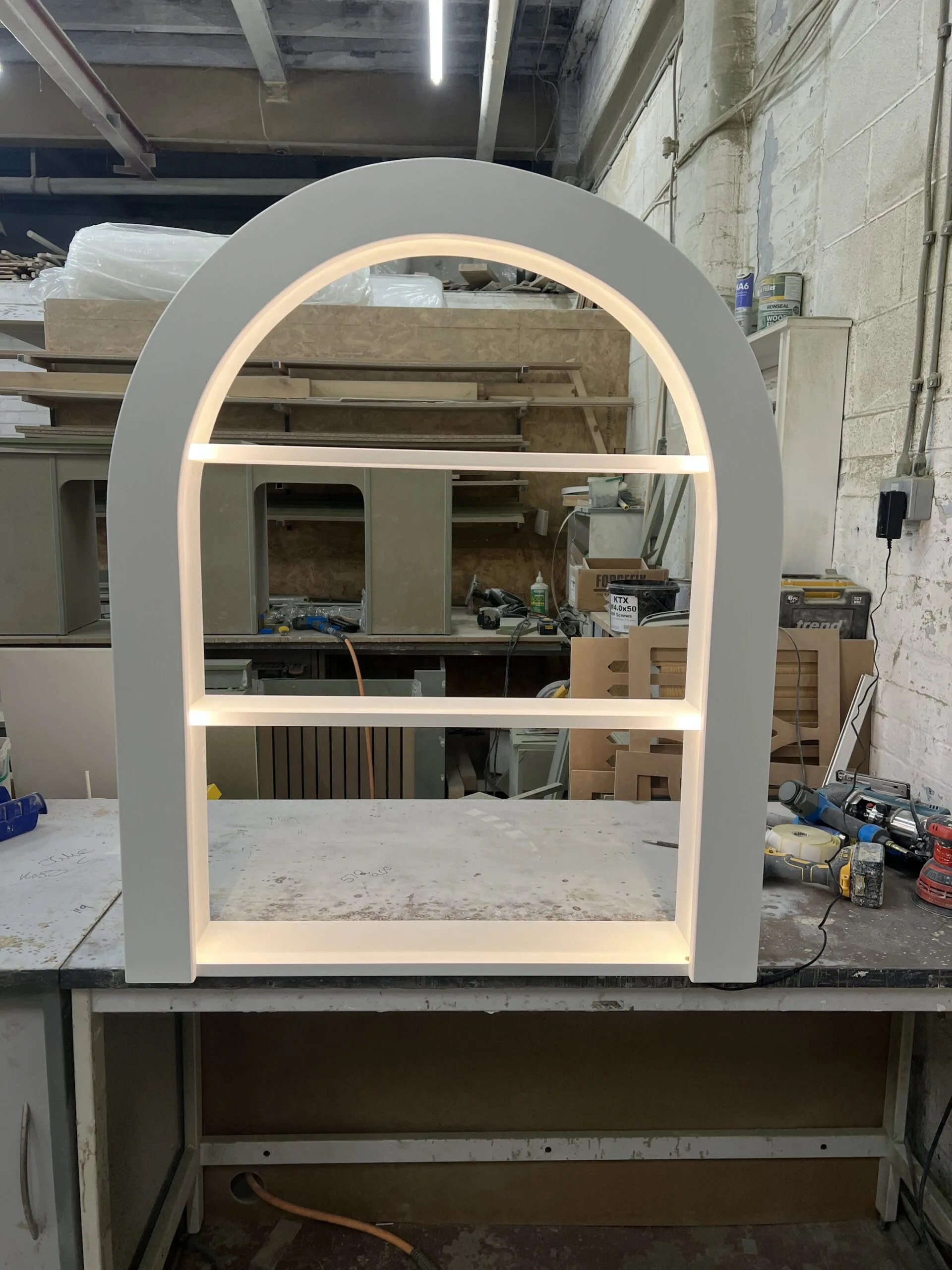 Elegant Skimming Stone Curved Floating Shampoo Display