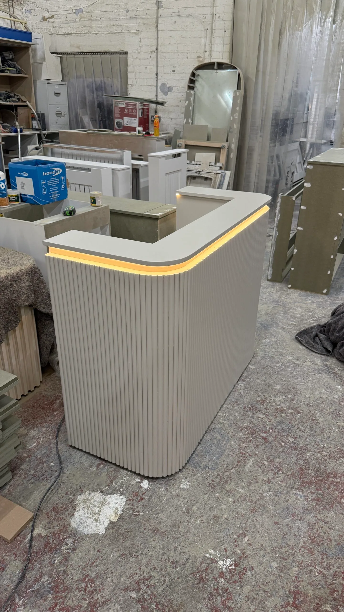 Bespoke Luxury Reception Desk, Skimming Stone