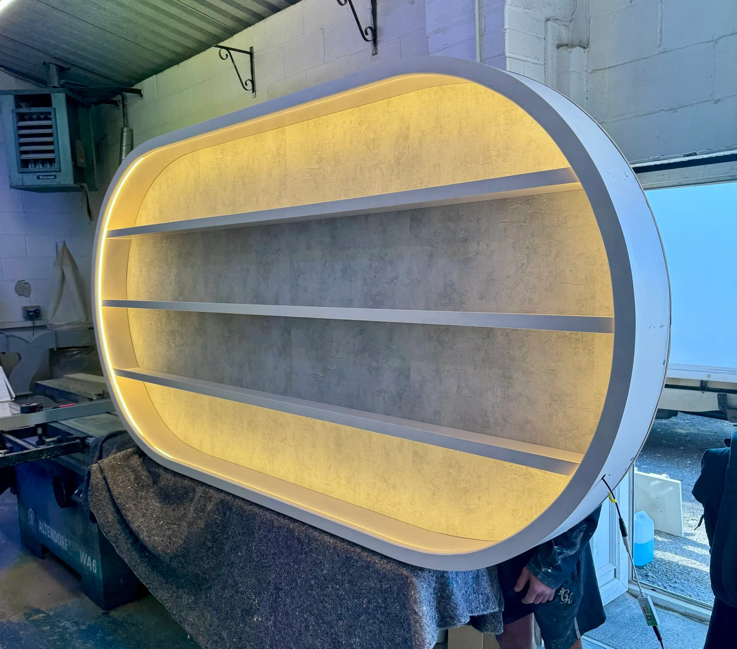 Salon LED Light Curved Oval Display in White with textured backing - Image 2