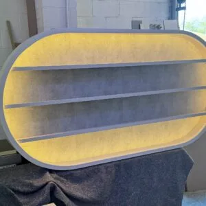 Salon LED Light Curved Oval Display in White with textured backing
