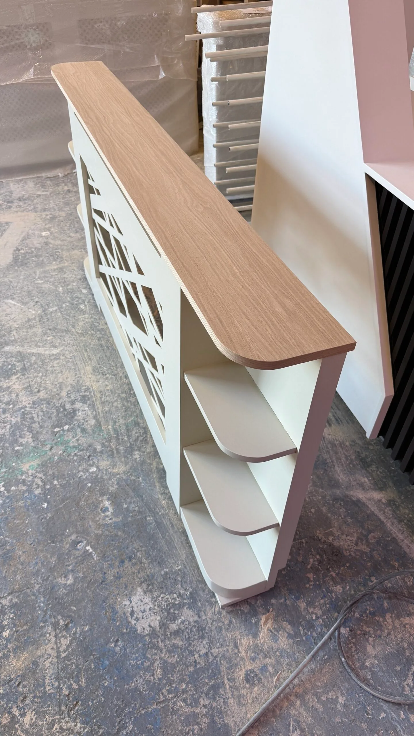 Messy abstract radiator cover with side shelves