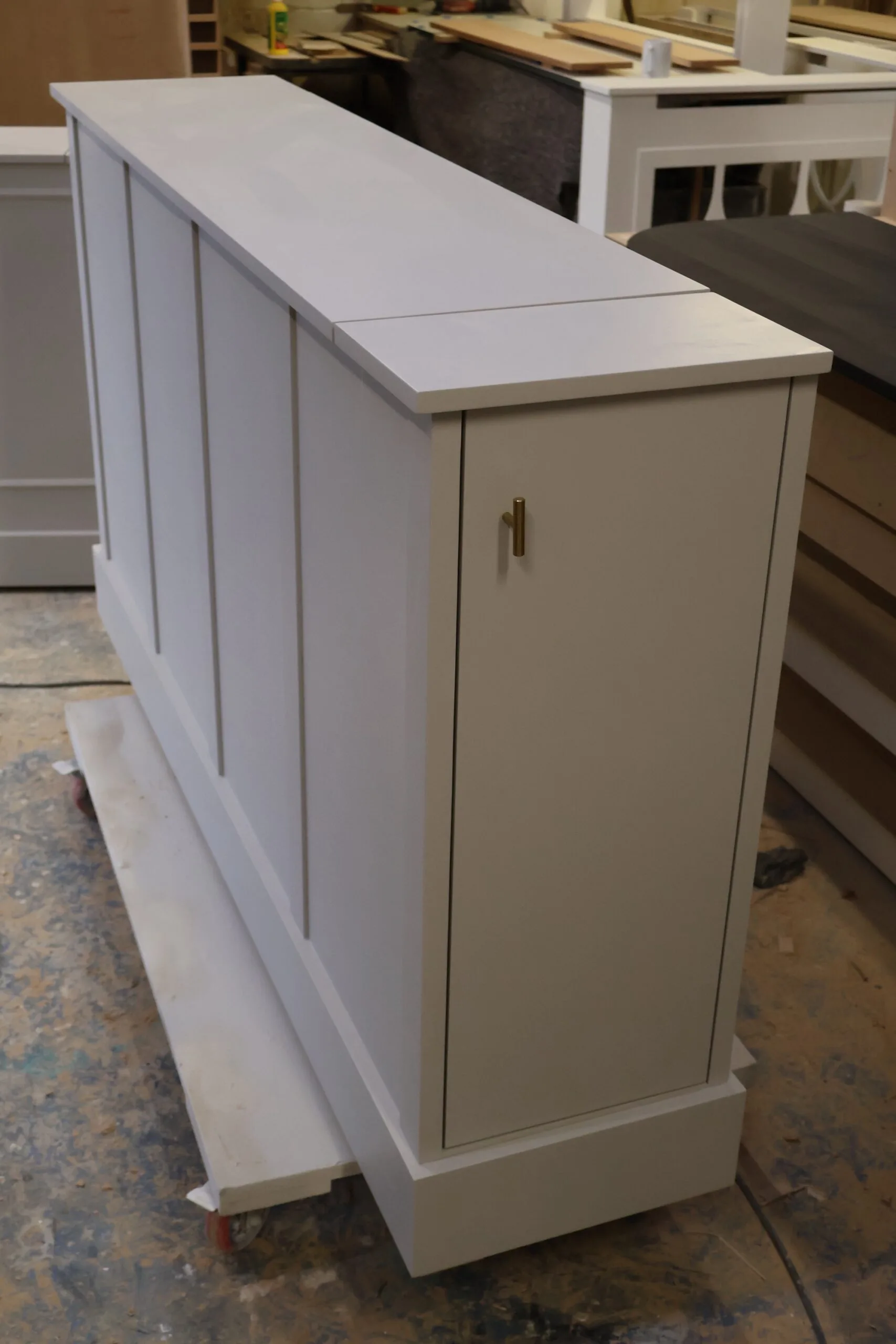 Solid oak motorised TV lift cabinet with natural wood grain and quiet lift mechanism