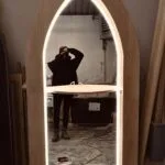 Luminous Arch Salon Mirror with Shelf