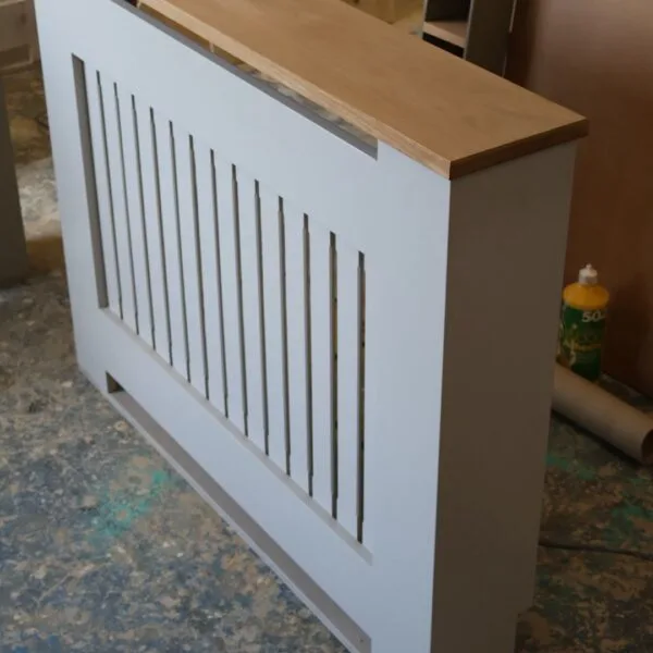 Bespoke white radiator cover with natural solid oak top and vertical slats