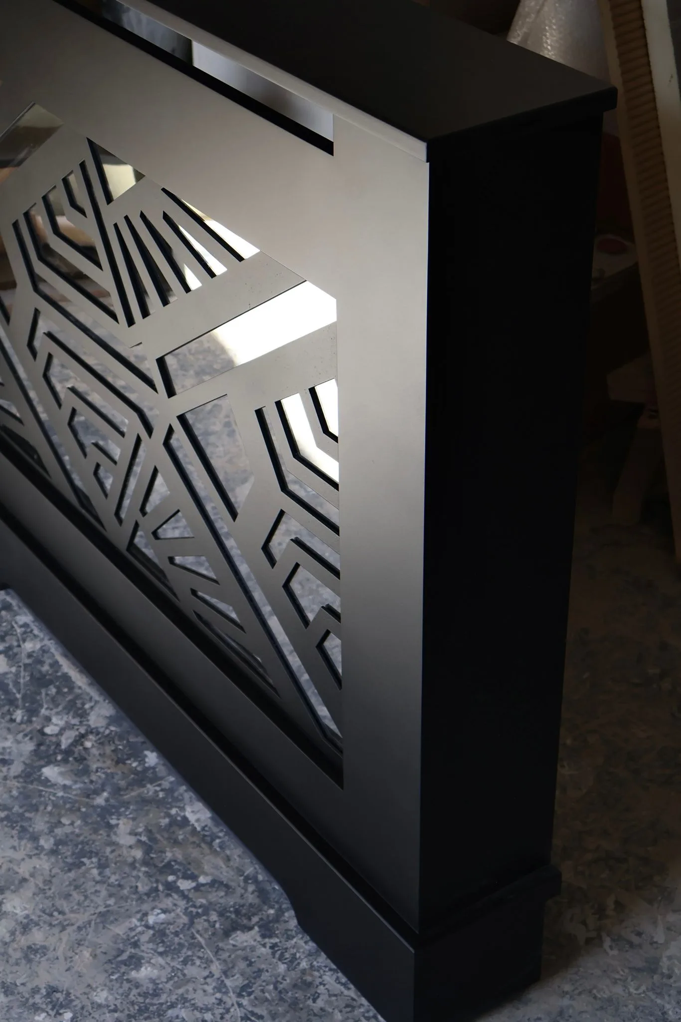 Bespoke matte black Art Deco geometric radiator cover handcrafted in UK