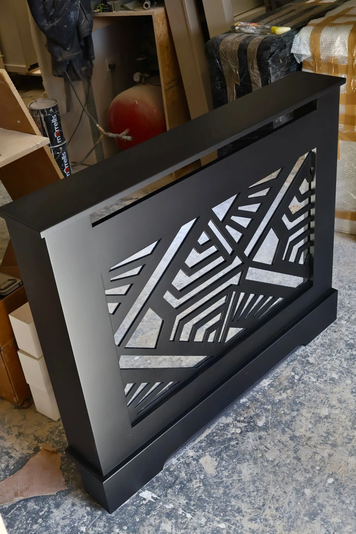 Bespoke matte black Art Deco geometric radiator cover handcrafted in UK