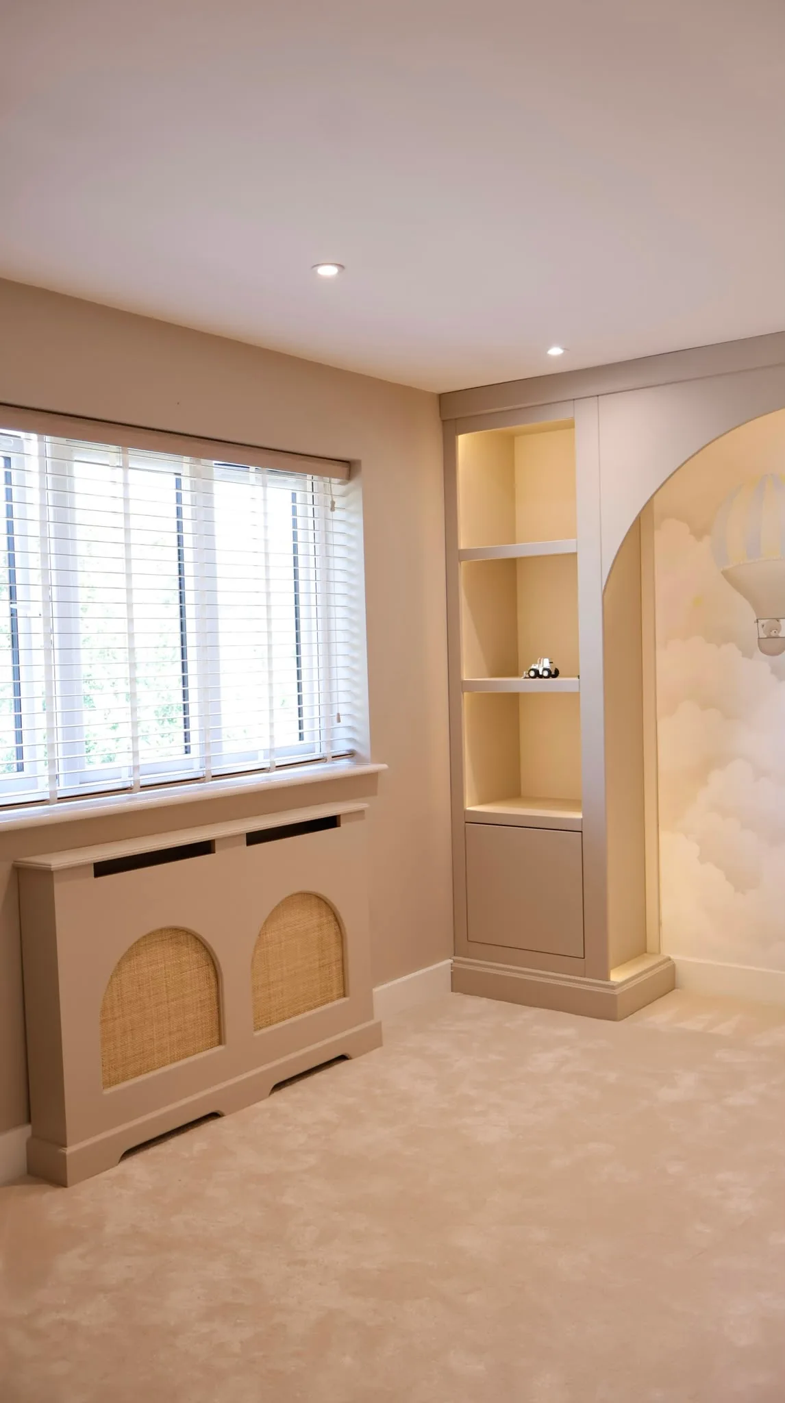 "Elegant radiator cover with curved rattan inserts for a stylish fitted interior