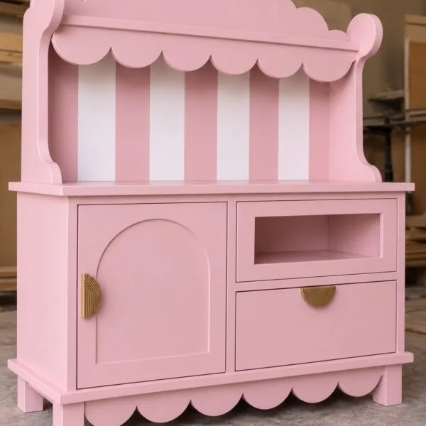 Blue wooden scalloped play dresser and storage unit with striped backing, LED lighting, and brass handles for children's rooms