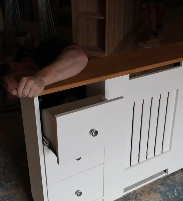 Radiator cover with side drawers, finished in white with medium oak stain 🤍