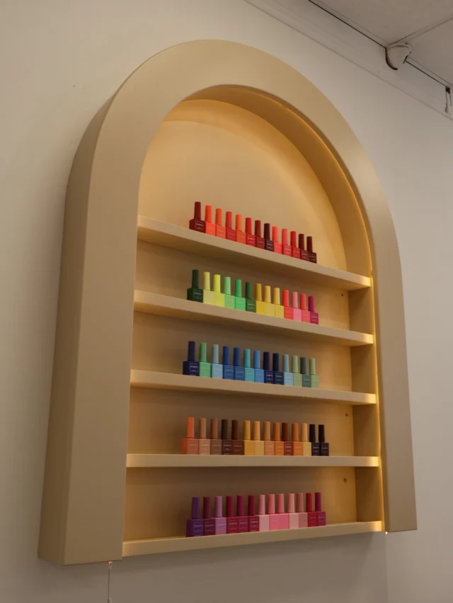 Bespoke curved nail varnish display finished in Oxford Stone 🩶